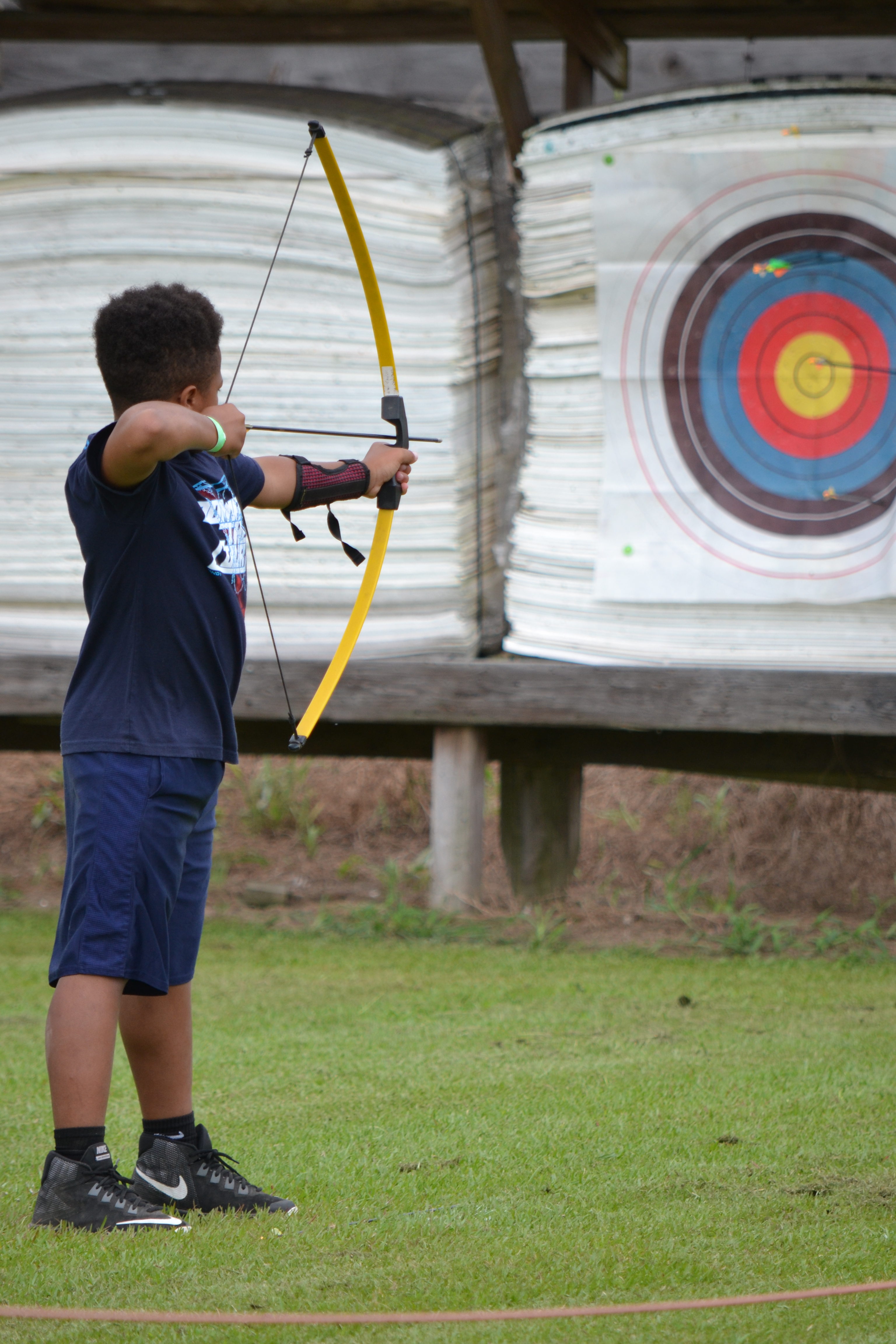 boy shooting arrow