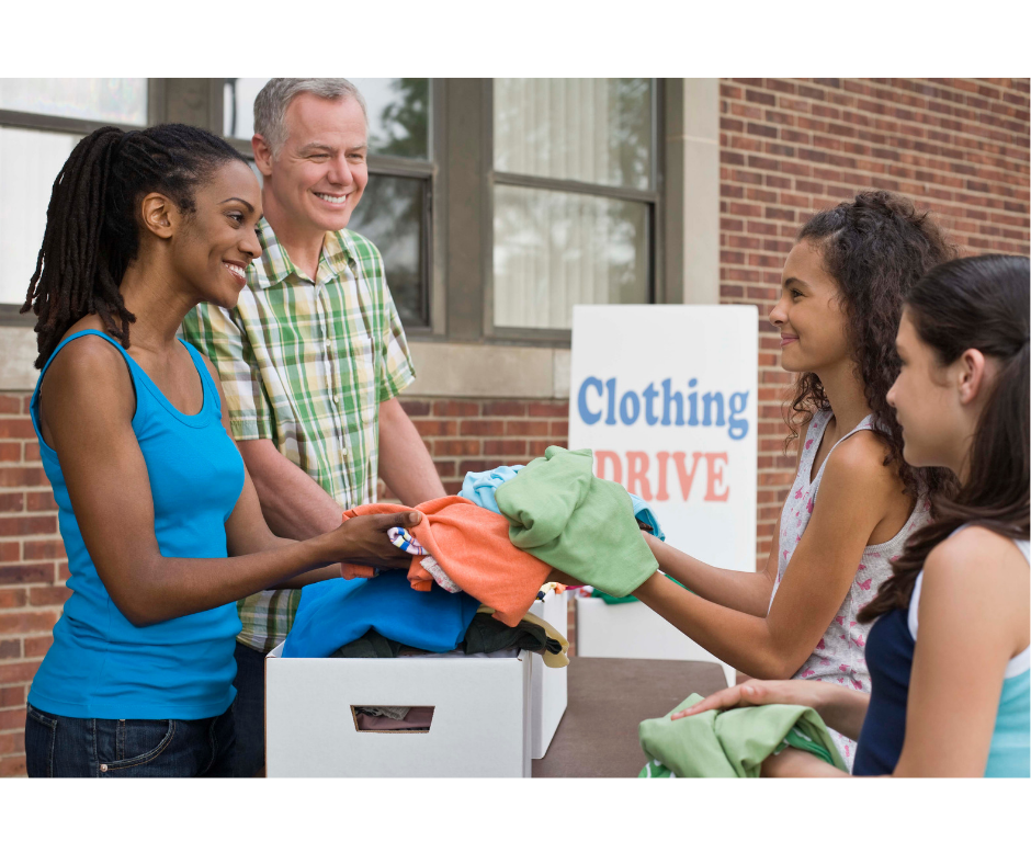 youth donating to clothing drive