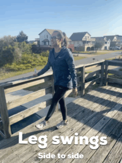 Woman exercising - leg swings